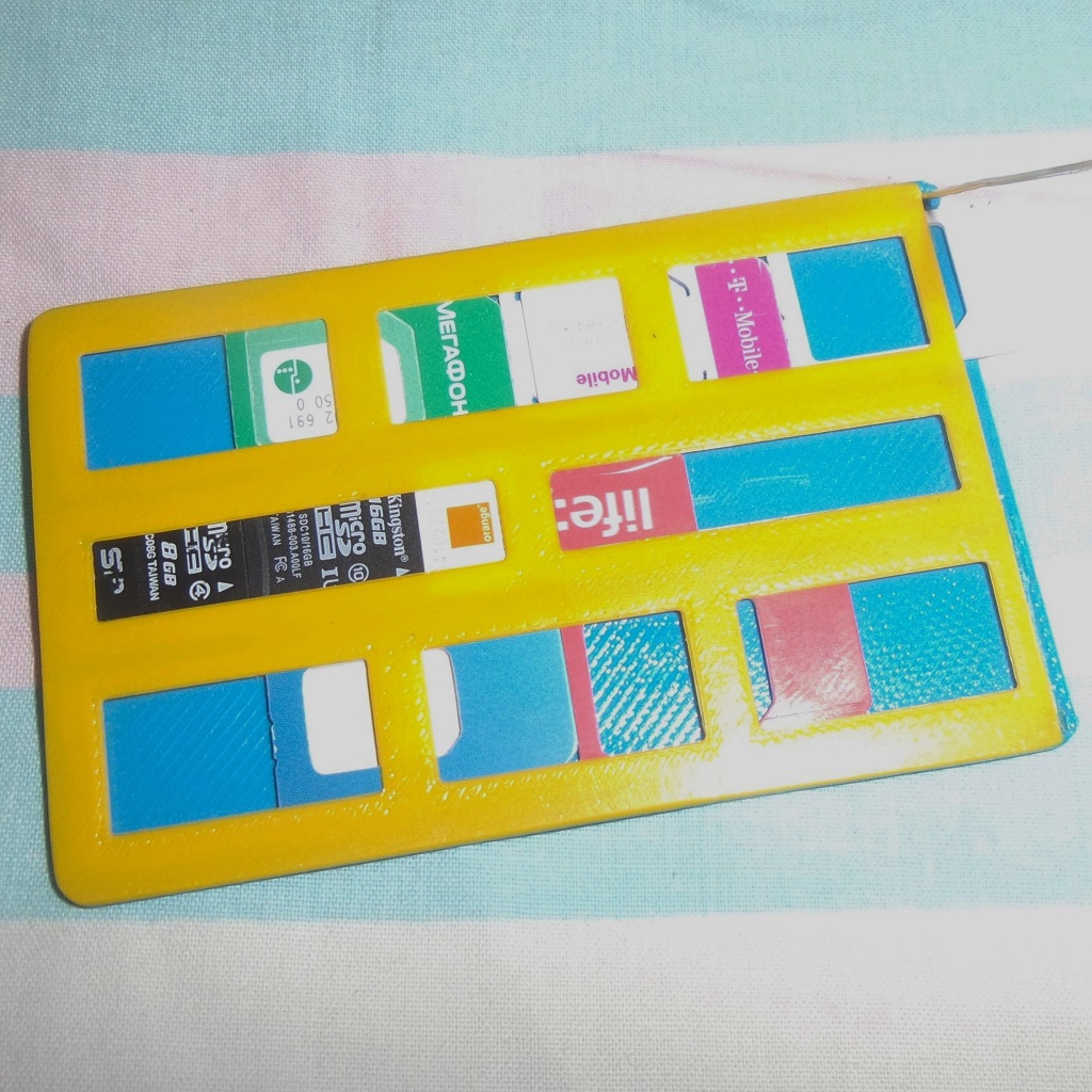 Nano SIM, Micro SIM, Mini SIM, and Micro SD flash cards holder